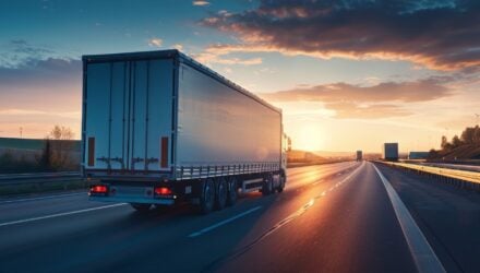 Truck on the road at sunset