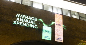 A view of an animation projected onto a flat building at London Bridge as part of a campaign by ChargeGuru UK highlighting the inequitable access to home chargers for millions of people living in flats.