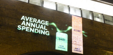 A view of an animation projected onto a flat building at London Bridge as part of a campaign by ChargeGuru UK highlighting the inequitable access to home chargers for millions of people living in flats.
