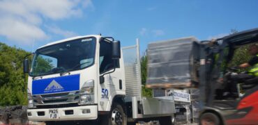 Mac roofing celebrates 50 years with new isuzu truck