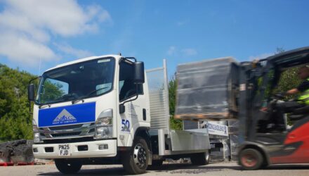 Mac roofing celebrates 50 years with new isuzu truck