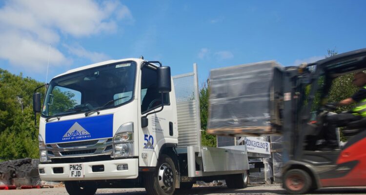 Mac roofing celebrates 50 years with new isuzu truck