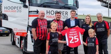 Hooper Haulage with Lincoln City FC executive Bobby Coppings