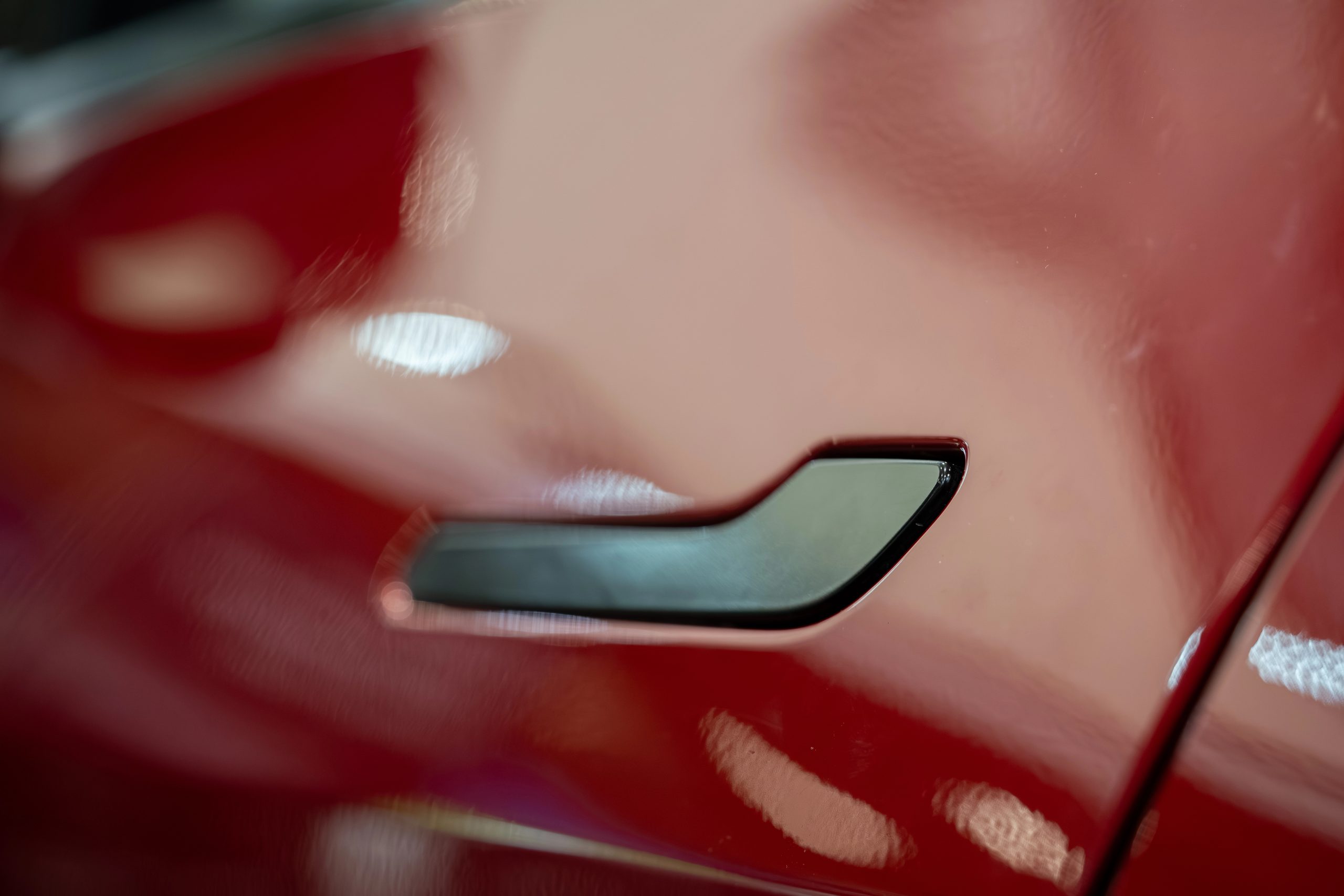 China orders EV recall over hidden door handle safety