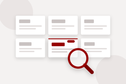 A grid of supplier listings with one featured listing under a magnifying glass